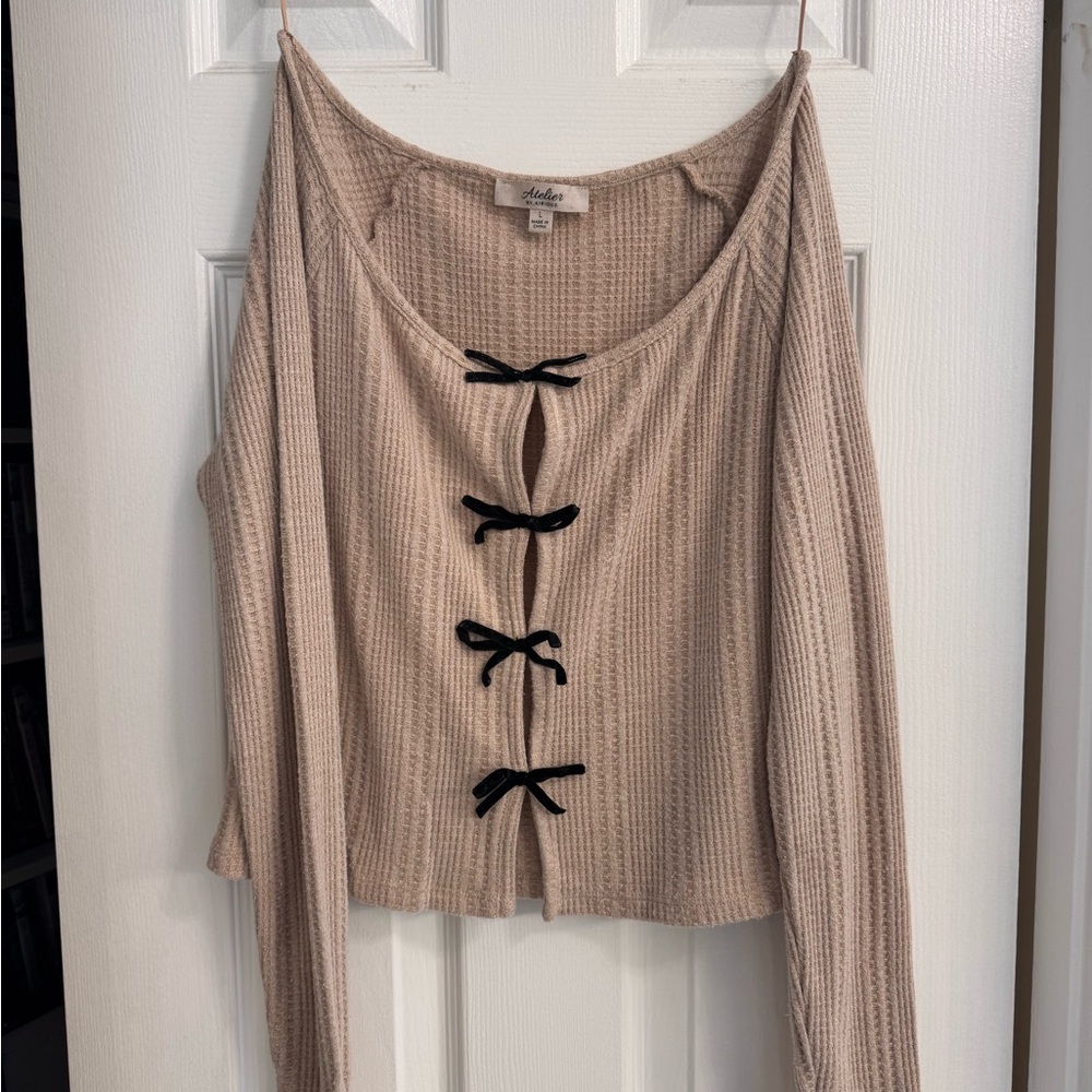 Beige Knit Top with Black Bow Accents